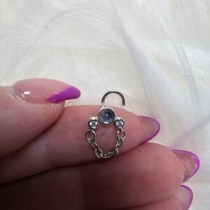 Elegant Silver and Blue Gemstone Nose Piercing